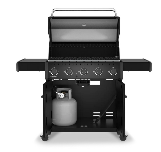 Black gas grill with a propane tank on a white background