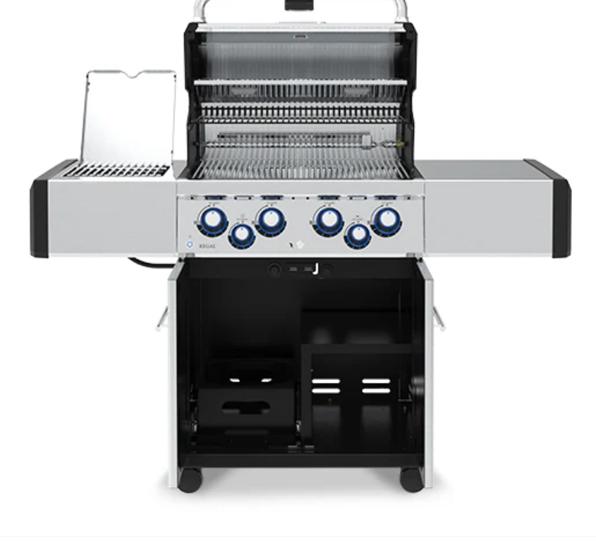 Outdoor grill with multiple burners on a white background