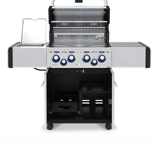 Outdoor grill with multiple burners on a white background